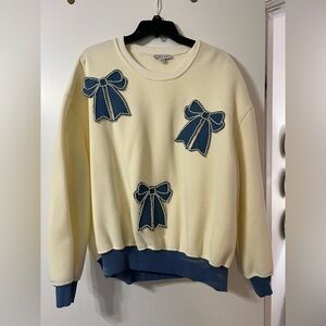 She + Sky Cream and Blue Bow Accent Sweater